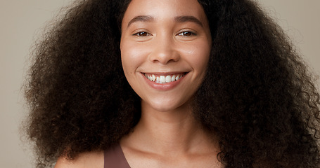 Image showing Beauty, haircare and smile with face of woman in studio for skincare, cosmetics or self care. Happy, hairstyle and natural with portrait of person on brown background for texture, health or wellness
