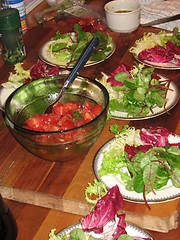 Image showing Salad on plates and tomatos in a bowl