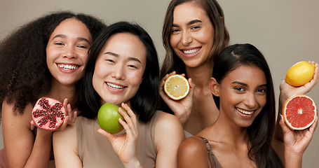 Image showing Women, portrait and beauty, diversity and fruit with dermatology and friends on studio background. Unique skin, natural cosmetics and inclusion, eco friendly skincare, smile and citrus for vitamin c