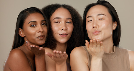 Image showing Beauty, women or friends blow kiss in studio for diversity, inclusion and wellness. Face of happy people on neutral background for different facial care, dermatology glow or makeup and cosmetics