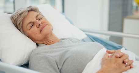 Image showing Hospital, sleep and senior woman in bed for recovery, resting and relaxing after surgery treatment. Healthcare, clinic and elderly female person with eyes closed for medical care, service and help