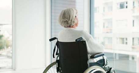 Image showing Thinking, woman in wheelchair and window in nursing home or person with disability in the hospital with depression or mental health. Depressed, sad and elderly person with.alzheimer or dementia