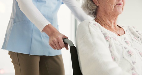 Image showing Nurse, senior woman and push wheelchair with helping hand, care and support for rehabilitation in clinic. Medic, elderly person with disability and mobility with empathy, kindness and retirement