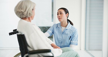 Image showing Medical, wheelchair and a woman nurse talking to a senior patient with a disability in a clinic. Healthcare, retirement and support with a female medicine professional talking to a resident at home
