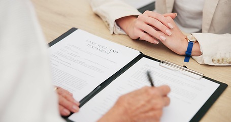 Image showing Document, signature and hands of a lawyer with a client for a will, planning death or agreement. Office, business and a legal employee writing on paperwork for a person for a law negotiation together