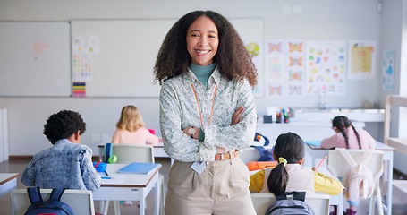 Image showing Teacher woman, arms crossed and smile in class with school kids, pride or happy for education career. Academy, classroom and learning expert for children, face or portrait with development for future