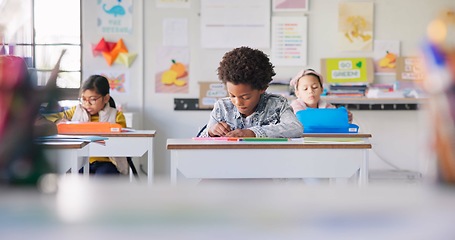 Image showing Education, boy and students in a classroom, writing or knowledge with creativity, lessons or notebook. Drawing, children or kids with inspiration, teaching or test with ideas, learning or development