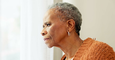 Image showing Senior woman, face and thinking by window at home to remember memory and relax in retirement. Serious black elderly person or old lady at nursing facility with hope, sad emotion and Alzheimer disease