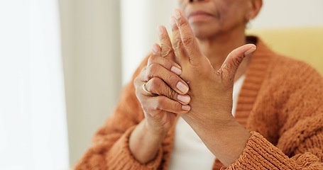 Image showing Hands, pain and arthritis with an elderly woman in her nursing home, struggling with a medical injury or problem. Healthcare, ache or carpal tunnel with a senior resident in an assisted living house