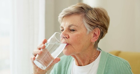 Image showing Health, wellness and senior woman drinking water for hydration and liquid diet detox at home. Weight loss, fresh and calm elderly female person enjoying glass of cold drink in modern retirement house