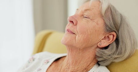 Image showing Senior woman, face and thinking on sofa at home to remember sad memory and relax in retirement. Serious elderly person or old lady at nursing facility with hope, negative emotion or Alzheimer disease