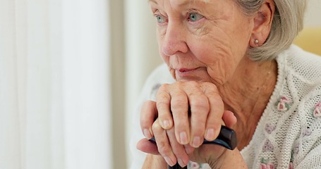 Image showing Senior woman, thinking and cane on home sofa to remember memory and relax in retirement. Serious or sad elderly person or old lady with a disability at nursing facility with Alzheimer and arthritis