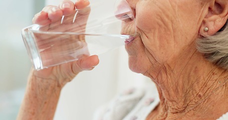 Image showing Thirsty, closeup and senior woman drinking water for hydration and liquid diet detox at home. Wellness, health and calm elderly female person enjoying glass of cold drink in modern retirement house.