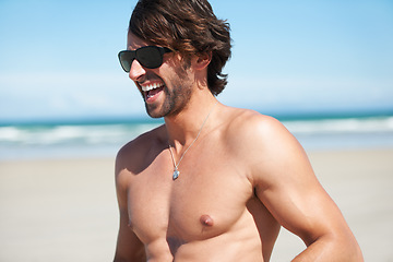 Image showing Summer, funny and the body of a man on the beach for travel, freedom or adventure on vacation. Sand, shirtless and a young person laughing by the ocean or sea on a tropical coast for holiday