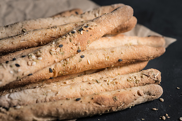 Image showing Bread sticks with salt and herbs