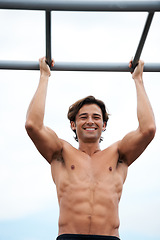 Image showing Pull up bar, happiness and man exercise for muscle building, bodybuilder performance or outdoor strength development. Fitness, sports training and athlete happy for workout, challenge or practice