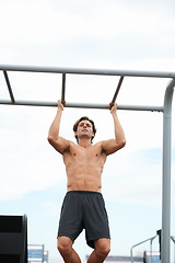 Image showing Pull up bar, outdoor and man exercise for muscle building, body builder performance or strength development. Muscular, fitness training and strong athlete for workout, challenge or active practice