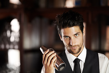 Image showing Shake, cocktail and portrait of bartender with a drink for customer in dark club or night. Mixing, alcohol and face of barman with liquor in metal container or shaker for a strong beverage in a bar