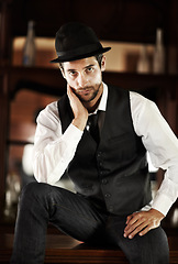 Image showing Gentleman, portrait or trendy fashion in pub to relax on break with cool style or elegant outfit in Italy. Barman, retro person or confident model in a hat or classy clothes for a vintage aesthetic