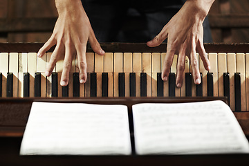 Image showing Paper, hands or artist with piano for music, performance or learning solo for entertainment or sound. Pianist closeup, man or creative musician playing jazz keys or notes on organ in top view