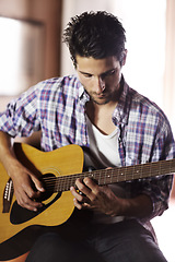 Image showing Guitar, play and man in recording studio with musician writing music with creativity. Artist, talent and skill with playing a notes on instrument, strings and creative sound in jazz or songwriting