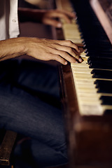 Image showing Jazz, hands or man with piano for music, performance or learning solo for entertainment or freedom. Closeup, pianist or creative musician playing keys on instrument or organ for artistic expression