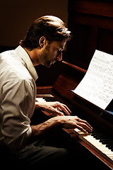Image showing Profile, musician and man with piano, artist and music with sound, audio and creative with performance. Person, player and entertainment with jazz, performer and listening with celebration or hearing