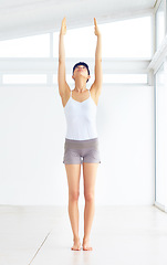 Image showing Stretching, fitness and woman with wellness, exercise and warm up with mockup, breathing and pilates. Person, healthy girl and athlete with training, workout and yoga with zen, challenge and energy