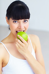 Image showing Apple, eating fruit and portrait of woman with organic product, fiber snack or morning nutrition for healthy balance. Weight loss diet, hungry vegan and face of nutritionist with self care food