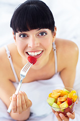 Image showing Fruit salad, eating or portrait of happy woman with a morning breakfast or lunch diet in home. Smile, gut health or healthy vegan girl with fruits, snack or food bowl meal to lose weight or wellness