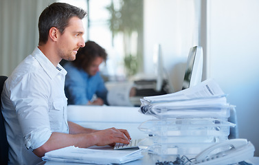 Image showing Business man, office and typing on computer for accounting report, budget planning and financial software. Professional accountant or employee on desktop with email management, paperwork or documents