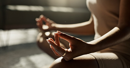 Image showing Meditation, hands woman in lotus pose on a floor for peace, zen or mental health wellness at home. Breathing, relax and female person in living room for energy training, exercise or holistic practice