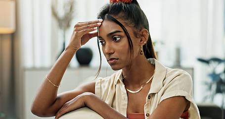 Image showing Depression, woman and thinking in home of pain, mental health and anxiety of debt, challenge or mistake. Stress, doubt and confused indian girl with headache of trauma, broken heart or burnout crisis