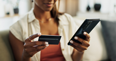 Image showing Hands, credit card and phone for closeup, home and woman with cybersecurity, fintech app and banking info. Girl, smartphone and payment for customer experience, budget or sales on e commerce website