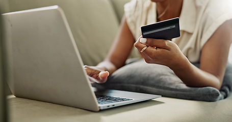 Image showing Credit Card, laptop and hands of person online shopping for discount, fintech service or ecommerce sales. Web store search, savings transfer payment and closeup customer banking on home lounge sofa