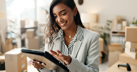 Image showing Happy woman, tablet and boxes in small business, logistics or supply chain at retail store. Female person smile with technology for shipping, communication or online networking at shop or warehouse