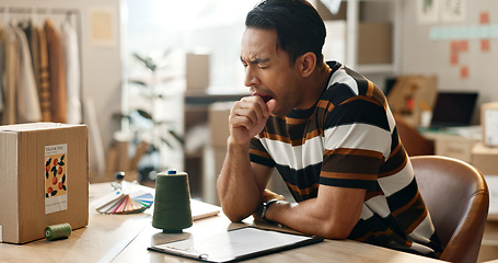 Image showing Fatigue, man and yawning with shipping company, delivery worker at desk with brain fog, small business and clipboard. Overworked, overtime and burnout with inventory or product checklist and tired