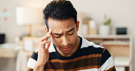 Image showing Frustrated man, headache and stress in anxiety, mistake or overworked in logistics at office. Closeup of male person with migraine, mental health or depression in fatigue, fail or bankruptcy and debt