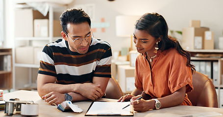 Image showing Small business, office and woman training an employee with logistics, checklist and planning a schedule. Working, strategy and people with inventory, paperwork and learning hr rules of workplace