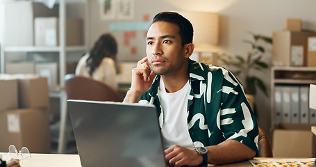 Image showing Logistics, man and thinking on laptop in office for research, feedback and supply chain for business. Asian, person and planning on pc for logistics, stock administration or package distribution data