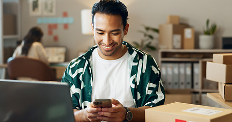 Image showing Happy asian man, phone and logistics for communication, social media or online order at boutique. Male person or delivery with smile and mobile smartphone for networking in small business at store