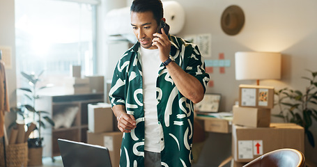 Image showing Man, phone call and laptop with boxes, startup inventory and e commerce and small business package or courier. Entrepreneur, supplier or seller talking on mobile and computer for logistics or order