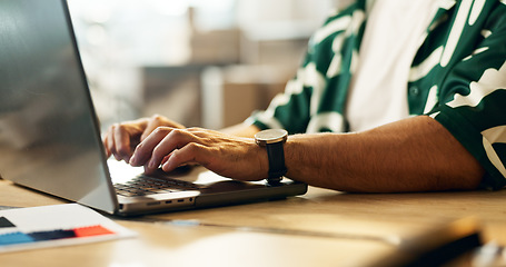 Image showing Man, laptop and hands typing for communication, email or online research on desk at office. Closeup of male person working on computer for networking, planning or web search on table at workplace