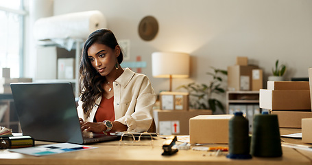 Image showing Woman, business and shipping on laptop in office for research, feedback and supply chain for ecommerce. Indian, person or planning on pc for logistics, stock administration or package distribution