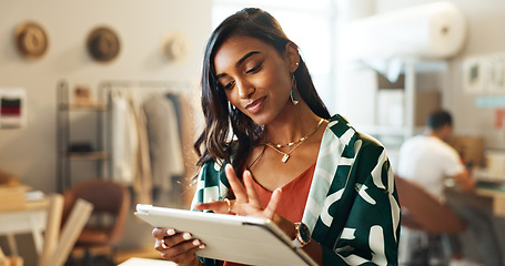 Image showing Woman, typing and tablet in small business for fashion, shipping and planning supply chan schedule. Online shopping, app and employee with tech in workshop with retail inventory, stock or checklist