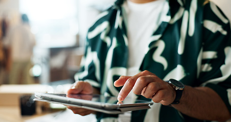 Image showing Man, hands and tablet of fashion designer in research, communication or networking at boutique. Closeup of male person on technology for online search, order or inventory inspection in retail store