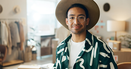 Image showing Happy, fashion and portrait of a man in retail for store management, ecommerce or designer work. Smile, mockup and an Asian employee at a distribution shop for clothes, sale or logistics of stock