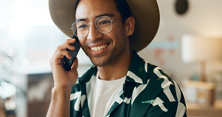 Image showing Thinking, talking and man on phone call in retail for networking, orders and planning stock. Happy, idea and an Asian employee in fashion with conversation about a sale at a boutique or shop online