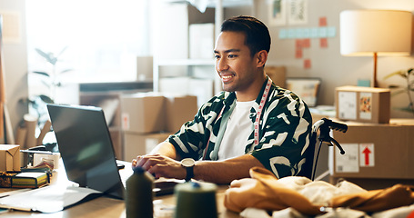 Image showing Asian man, laptop and small business in logistics for order, ecommerce or design at boutique. Male person, tailor or fashion designer on computer for inventory, storage or inspection at retail store