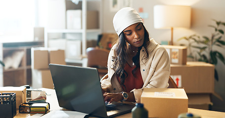 Image showing Woman, laptop and small business in logistics with box for order, ecommerce or pricing at boutique. Female person or fashion designer on computer for inventory, storage or inspection at retail store
